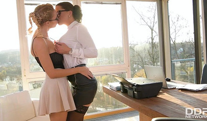 Two adorable lesbians play around with each other's tight wet pussies and moan