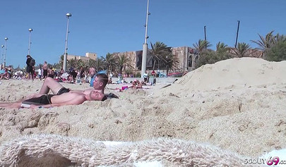 Real MILF German lesbians get caught while having great sex on a public beach