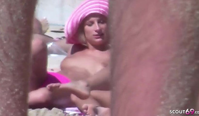 Real MILF German lesbians get caught while having great sex on a public beach