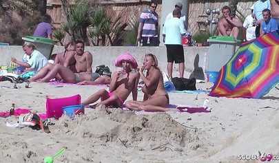 Real MILF German lesbians get caught while having great sex on a public beach