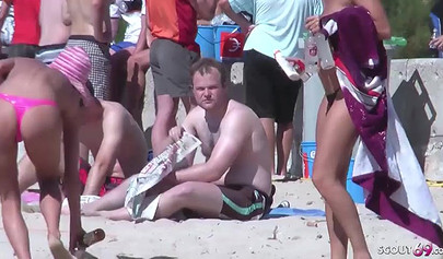 Real MILF German lesbians get caught while having great sex on a public beach