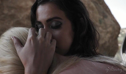 Public girl on girl sex right in the middle of a desert for two sexy MILF ladies