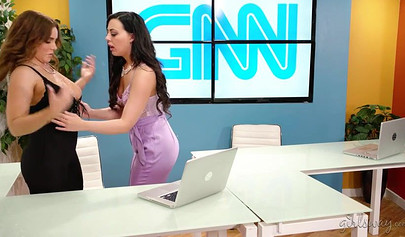 MILF colleagues enjoy a nice round of girl on girl fun in their own office