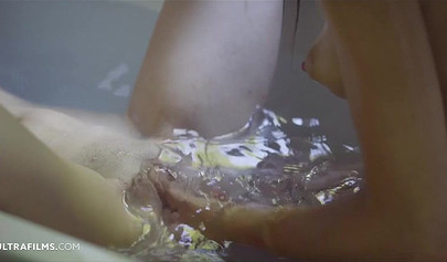 Lesbians engage in some amazing girl on girl action in a bathtub with bubbles