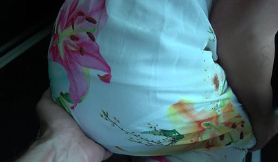 Playful lesbians play with each other on the backseat of a car and suck a fat dick