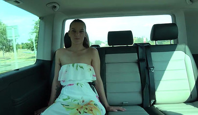 Playful lesbians play with each other on the backseat of a car and suck a fat dick