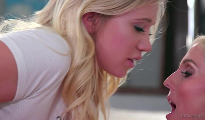 Mature blonde dyke seduced by a younger girl into hot and steamy licking and sex