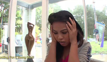 Asian lesbian brunettes eat each others snatches while sitting on the couch