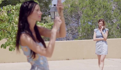 Playful young lesbians strip next to a tree outside to enjoy sloppy pussy licking