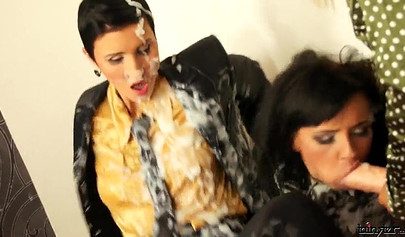 Glamorous lesbians in classy outfits fuck each hard other with massive strapons