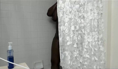 Horny ebony lesbians with monster curves shower together and fist themselves rough