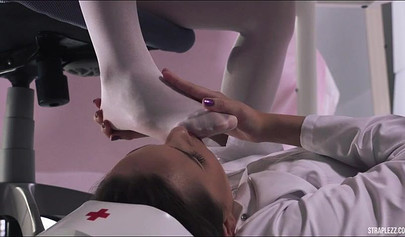 Nurses play around with each other's bodies but focus on the feet for most part