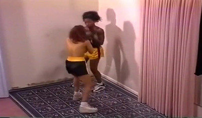 Nymph lesbian interracial Milfs with big tits are having a brutal boxing session