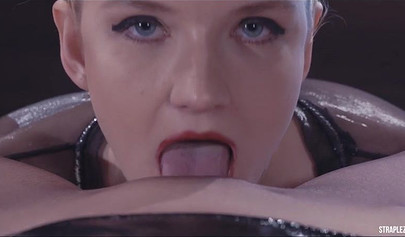 Nasty lesbian licks her lover's pussy before penetrating her using a strapon