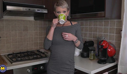 Mature experienced lesbian strips a young woman and licks on her tight cunt