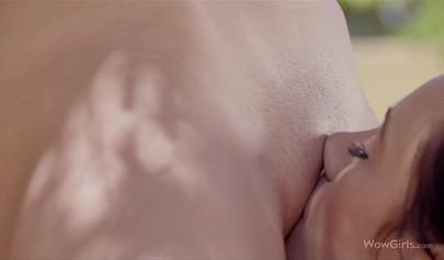 Making girl on girl passionate love under a big and beautiful tree in nature