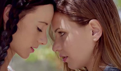 Making girl on girl passionate love under a big and beautiful tree in nature