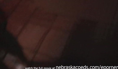 Short-haired lesbian is fucking her pussy with banana after getting naked