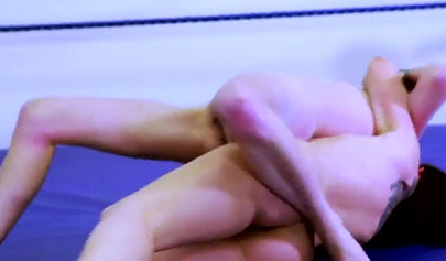 Rough wrestling in the ring turns into hardcore lesbian pussy licking and fucking