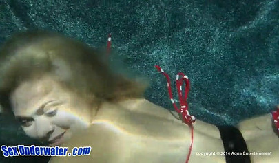 Horny lesbian babes get turned on for each other before fucking hard underwater