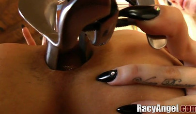 Lesbian anal action with a big purple dildo and two sexy and busty slut models