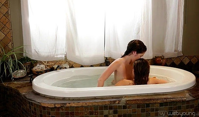 Slutty teen dykes are kissing and eating their pussies while in the bathroom