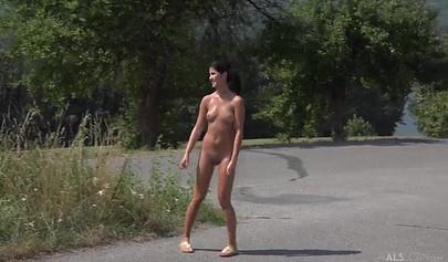 Sexy brunette play with her twat by the pool