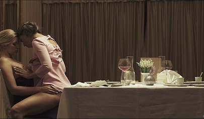 Gentle sex near the mirror after a romantic dinner