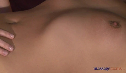 Nice masseuse gives an erotic massage to her client
