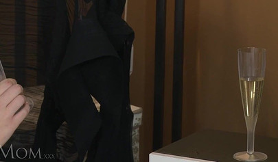 Sexy MILFs play with a giant pink dildo in bed