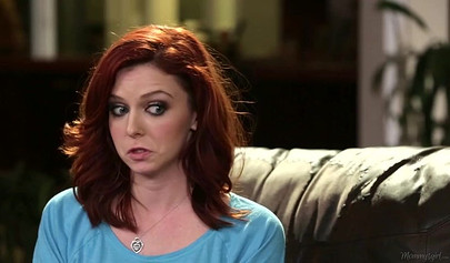 Syren De Mer and Emma Evins have sex on a black couch