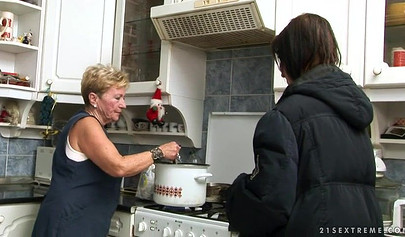 Busty girl tribbing with mature lady on the floor