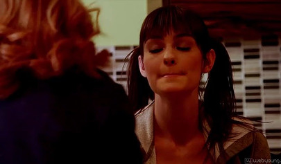 Blonde and brunette in bright socks satisfy each other