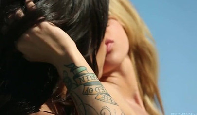 Gorgeous blonde and exotic brunette hotties have steamy lesbian sex by the sea