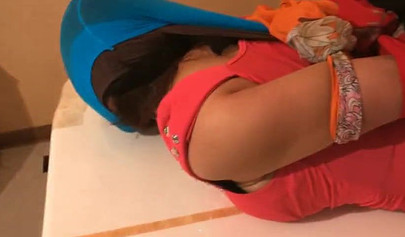 Asian scarf bondage with pantyhose on a face