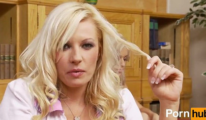 Busty chicks take part in a lesbian orgy on the couch