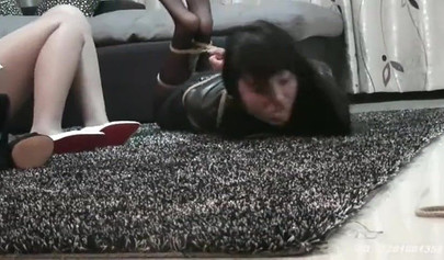 Chinese girls practice bondage action on the floor
