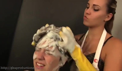 Nice housewife washes her girlfriend's hair and boobs