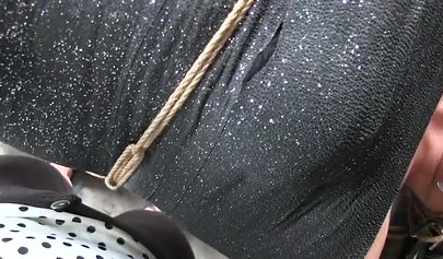 Two experienced MILFs practice bondage in the garage