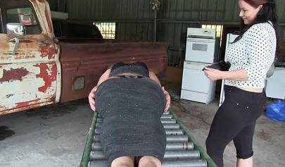 Two experienced MILFs practice bondage in the garage
