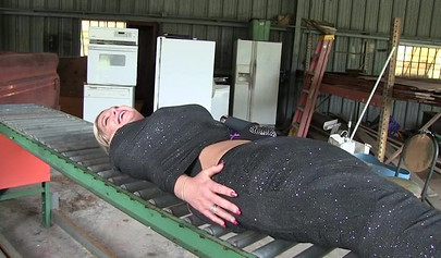 Two experienced MILFs practice bondage in the garage