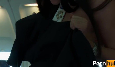 Sexy flight attendants fuck each other with a dildo