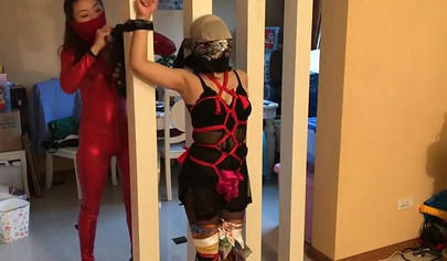 Asian girl is enjoying a bondage with her mistress