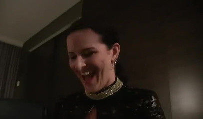 Redhead mistress practices bondage with her submissibve slave