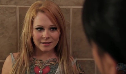 Blonde & brunette fingering each other in the bathroom