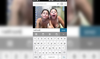 Petite teens licking toes in a webcam porn video