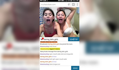 Petite teens licking toes in a webcam porn video