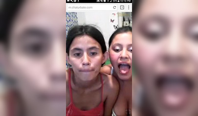 Petite teens licking toes in a webcam porn video