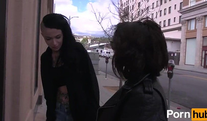 Tattooed punk girl satisfying her pretty girlfriend