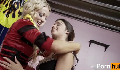 Cute babes in sexy lingerie are using a double-sided dildo